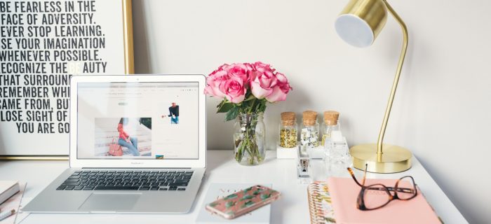 affordable essential otems for an organised home and life. tidy desk in white and pink tones
